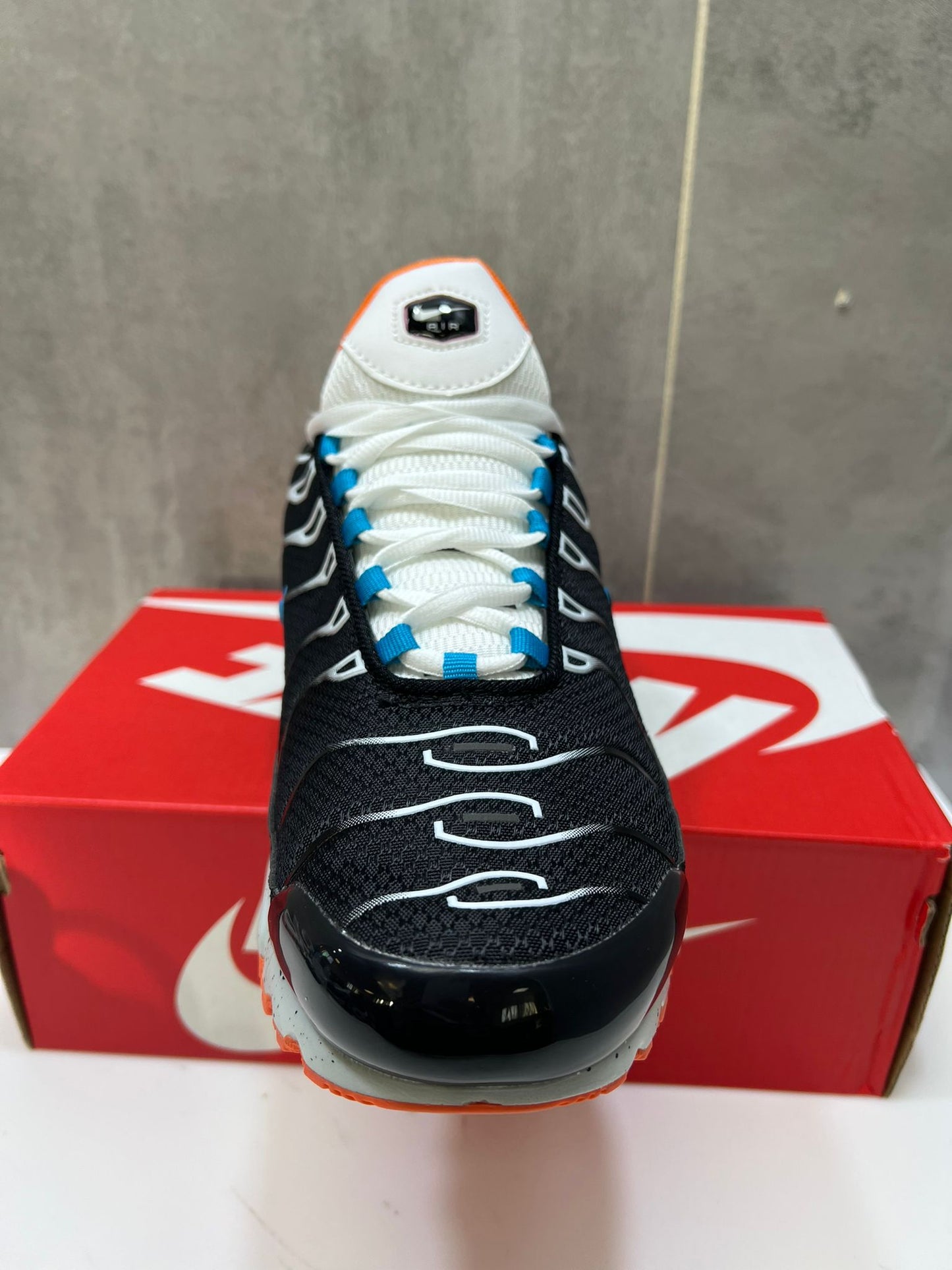 Nike Air Max Plus TN's Black with Orange Accent Sports Trainers