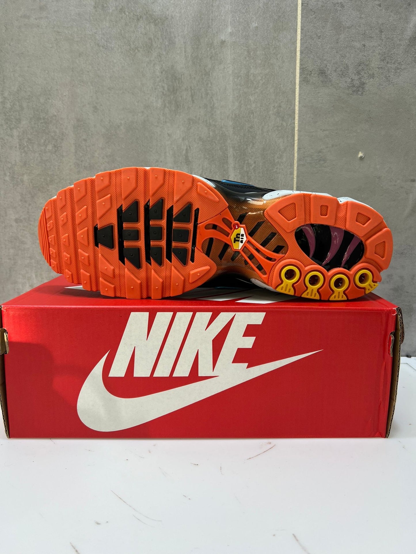 Nike Air Max Plus TN's Black with Orange Accent Sports Trainers