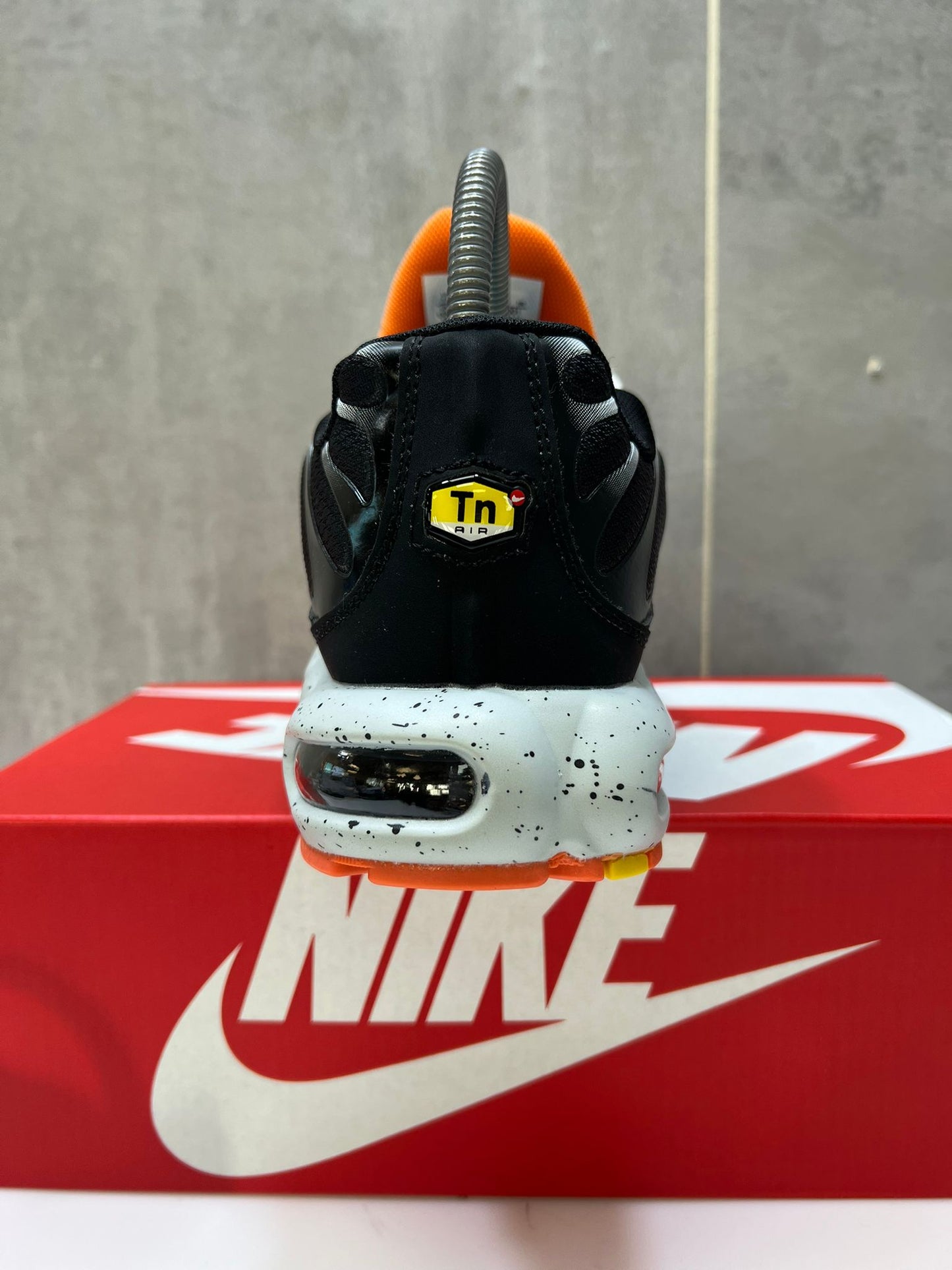 Nike Air Max Plus TN's Black with Orange Accent Sports Trainers